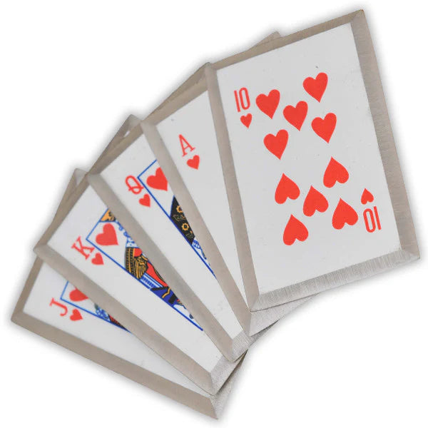 Four playing cards with red hearts on a white background
