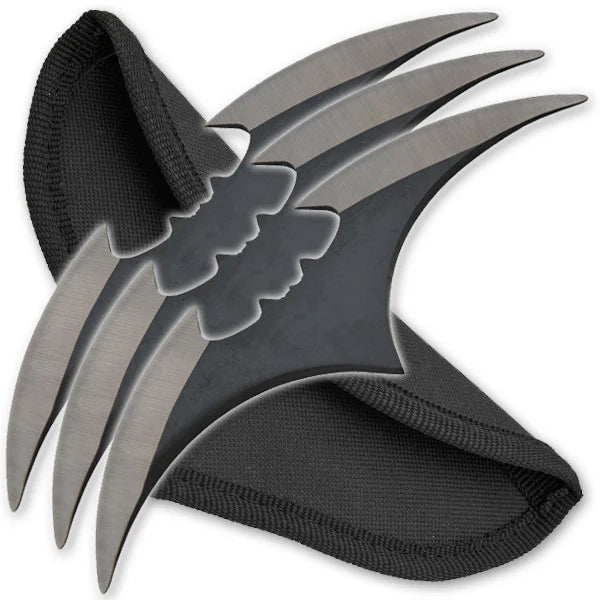 Set of metal claws with black sheaths on a white background